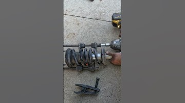 How to use strut spring compressor tool.
