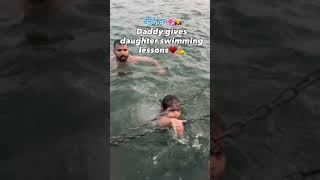 नर्मदे हर🙇‍♀️🌸 Daddy gives daughter swimming lessons #maheshwar #water #waterpark #waterfall