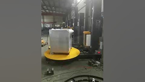 Pallet wrapper with weighing scale