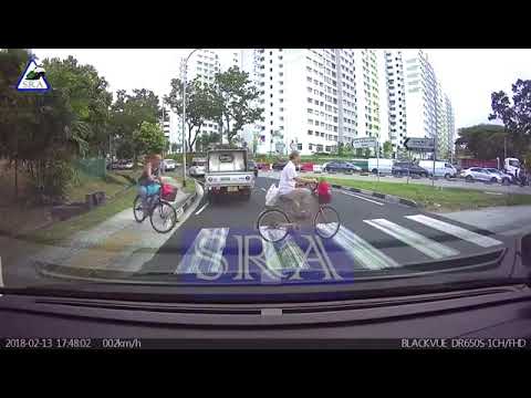 Car knockdown cyclist at zebra crossing