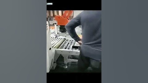 A4 paper sheet carton box PP strap sealing packing machine with robot hand palletizing machine