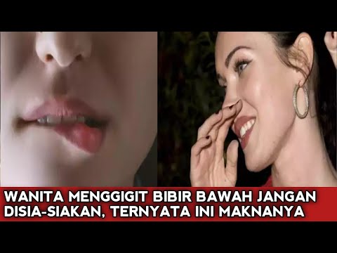 Video: Apa artinya ketika seseorang menggigit bibir Anda?