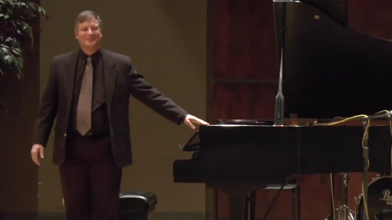 Scott Carrell plays Crossings