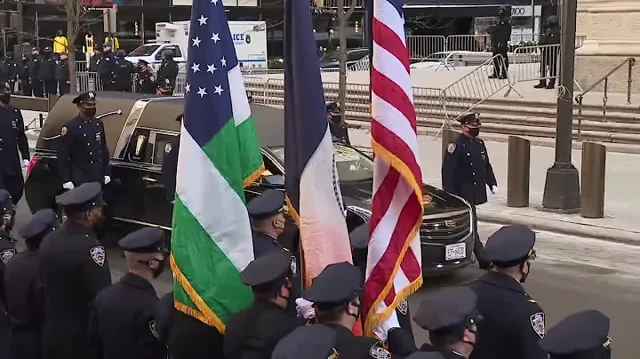NYPD Officer Wilbert Mora's casket carried into St...