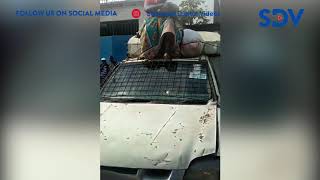 Frustrated woman climbs on top of city council vehicle to protest assault by “Kanjos”