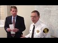 Sheriff Bruce Klinger accepts check for $1500 from Randy Hofmann for secure holsters to be worn by d
