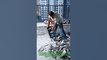 Demolish Concrete Floor for Renovation using A Demolition Hammer