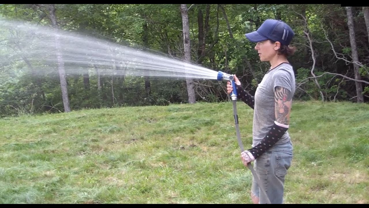 Functional Garden Hose Using Solar Powered Pump And Collected Rainwater