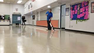 WAXIE demo applying floor finish with microfiber flat mops