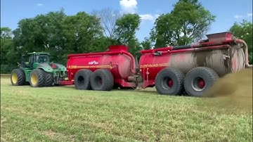 Spreading manure on hay fields
