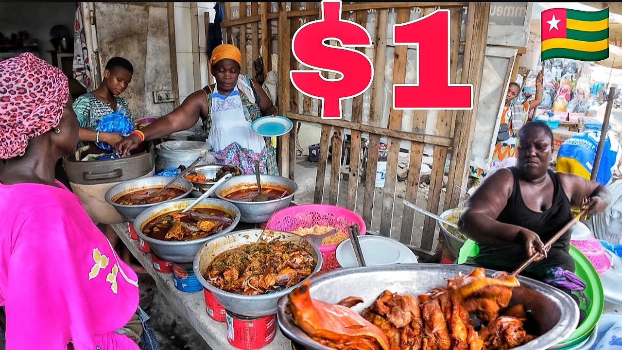 Что можно купить за 1 доллар в самой дешевой стране Африки? Челлендж уличной еды за 1 доллар в То...