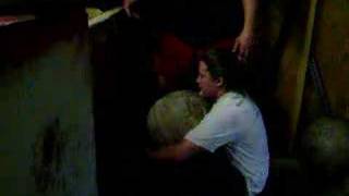 Amy loading a 165 pound atlas stone