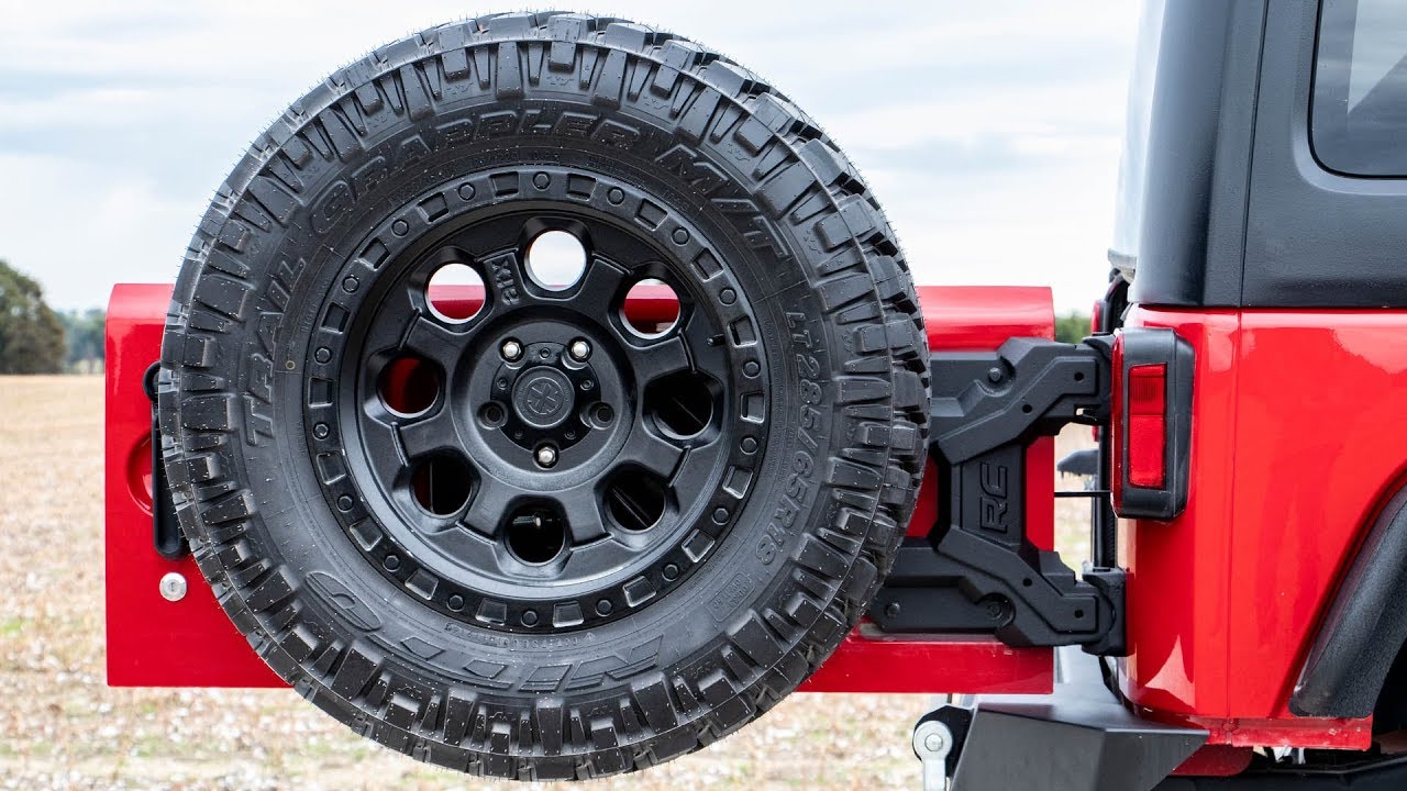 Jeep Wrangler JK Heavy Duty Hinged Spare Tire Carrier by Rough Country -  YouTube