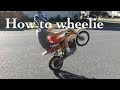 How to wheelie electric dirt bike