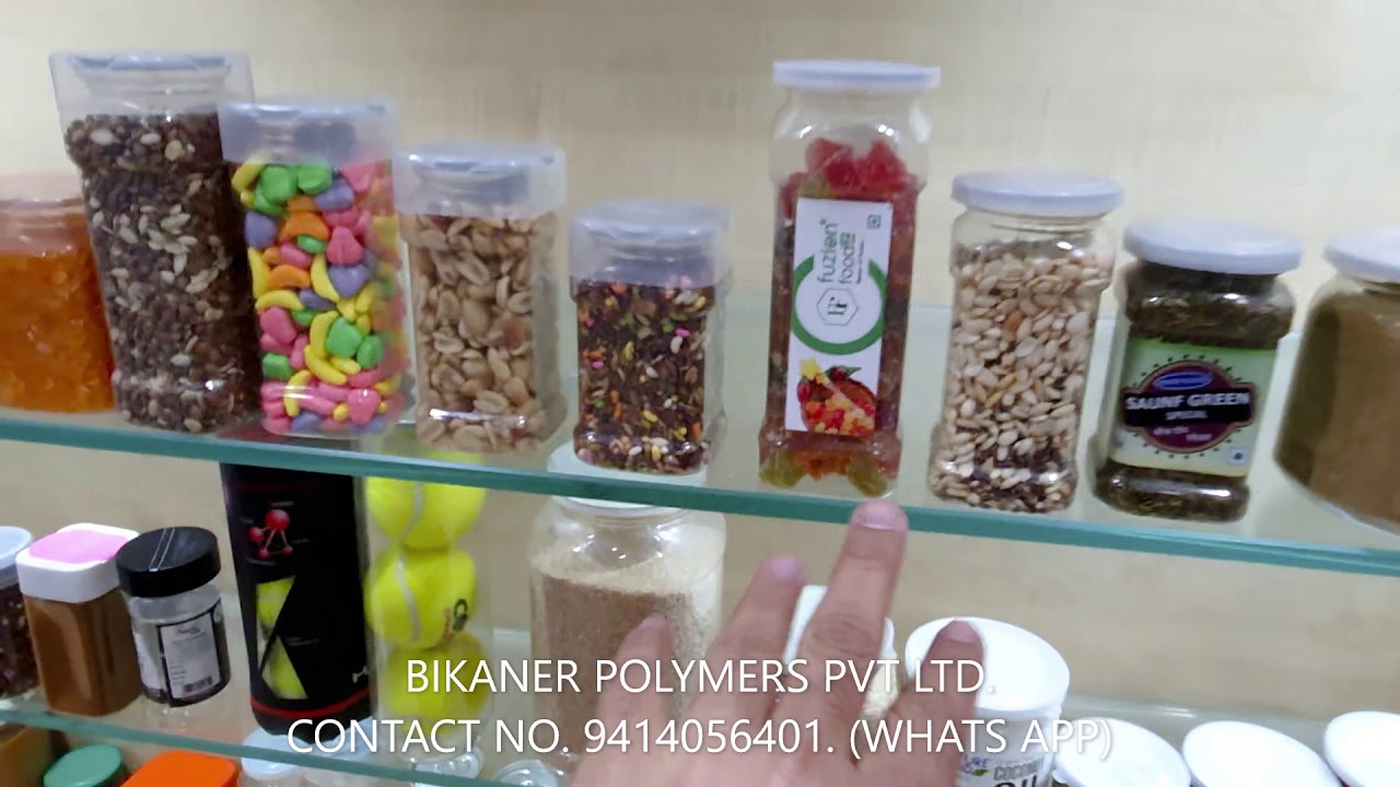 Transpet Pet cans - Product display with pet can seaming  machines running demo.