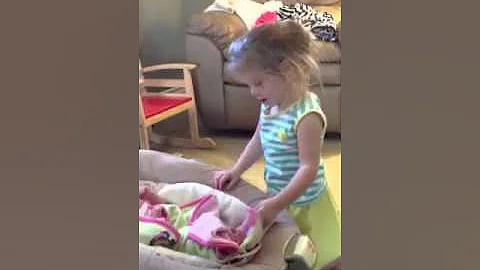 Brooklyn Jeanette Austin taking care of her sister