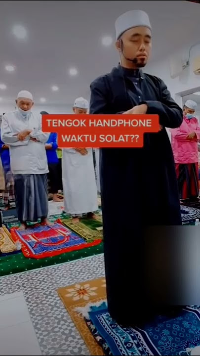Imam Shalat Pegang HP  Bolehkah,karena lupa blm di of