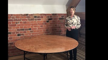 Measuring  a round table for a Wipe Easy Tablecloth