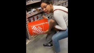Kid gets stuck in bucket