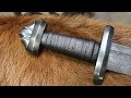 Forging a pattern welded viking sword, the complete movie.