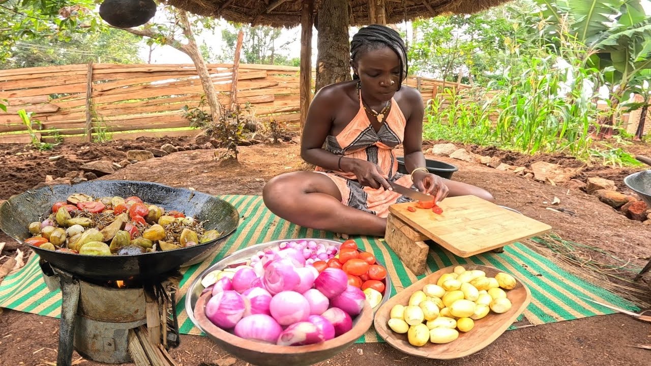 African Village Girl Cooks Delicious meal For Lunch