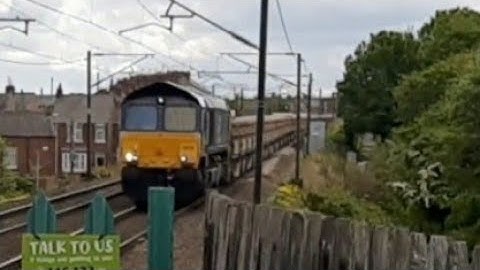 DRS Class 66 hauls Network Rail bulk ballast train through Chester-Le-Street train station