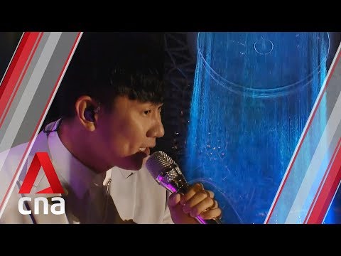 jj-lin-performs-at-jewel-changi-airport's-rain-vortex