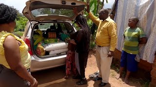 Good Samaritan Mama Uganda with weekly groceries
