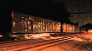 CSX Q702-06 and Q174-05 at Woodbourne, Pennsylvania on October 6, 2010