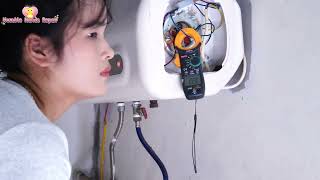 The girl replacing the thermal relay of a water heater_HUMBLE HANDS REPAIR