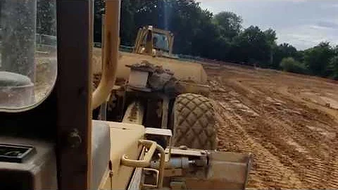 Cat D6 and box in action, and D4 push loading