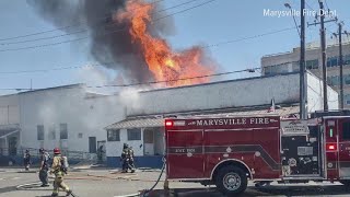Crews battle large structure fire in Marysville