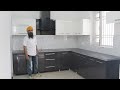 Gray and White colour  moduler Kitchen made by Jaswant Singh Carpenter