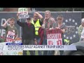 Demonstrators continue rally against proposed Trump Arch