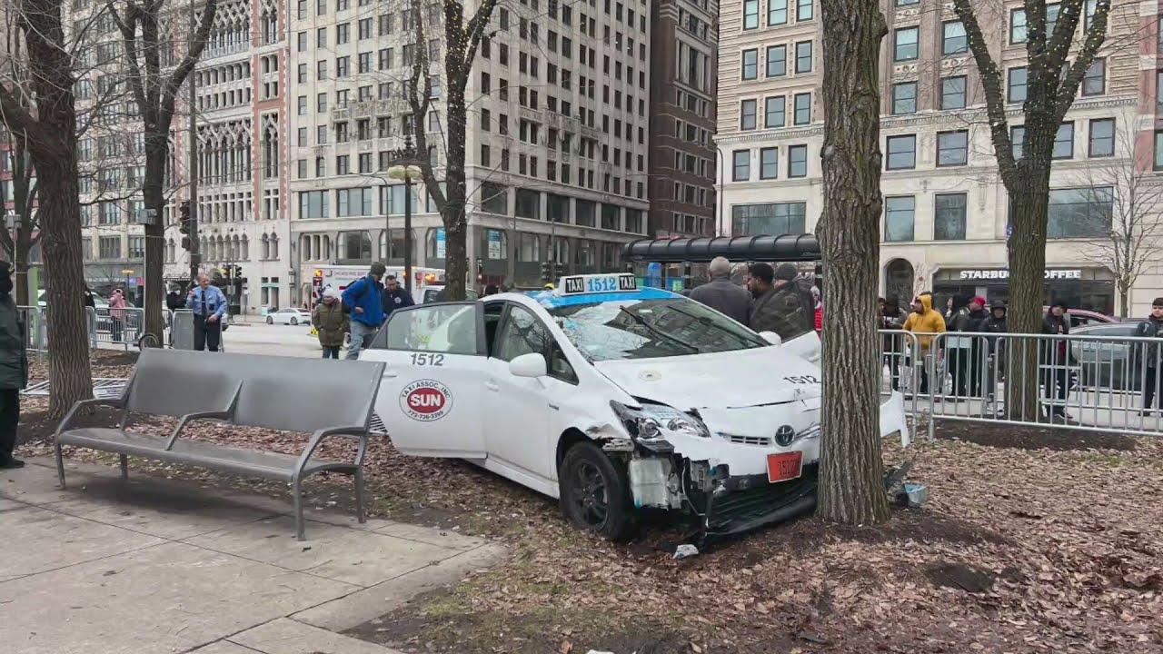 Driver crashes into tree near ice rink in Millennium Park - YouTube