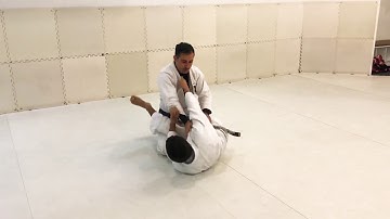 Learn how to counter the scissors sweep and transition to the slingshot mounting technique.