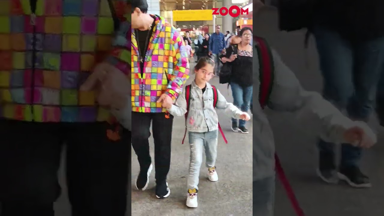 Karan Johar's cute moment with his kids Yash and Roohi at airport 