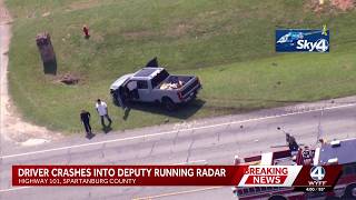 Driver crashes into deputy who was running radar along Upstate highway s say
