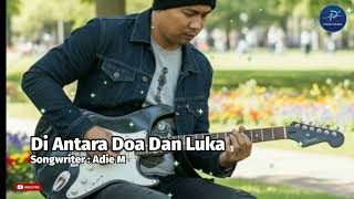 Download Lagu Lagu Slow Rock Balada Terbaru - Di Antara Doa dan Luka - Adie Musika MP3