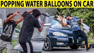 Smashing Water Balloon On Car Wind Screen Prank   Part 3  Lahori PrankStar