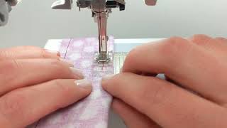 How to Sew Around a Pin on the Sewing Machine - a Stitch Clinic Beginner Tutorial