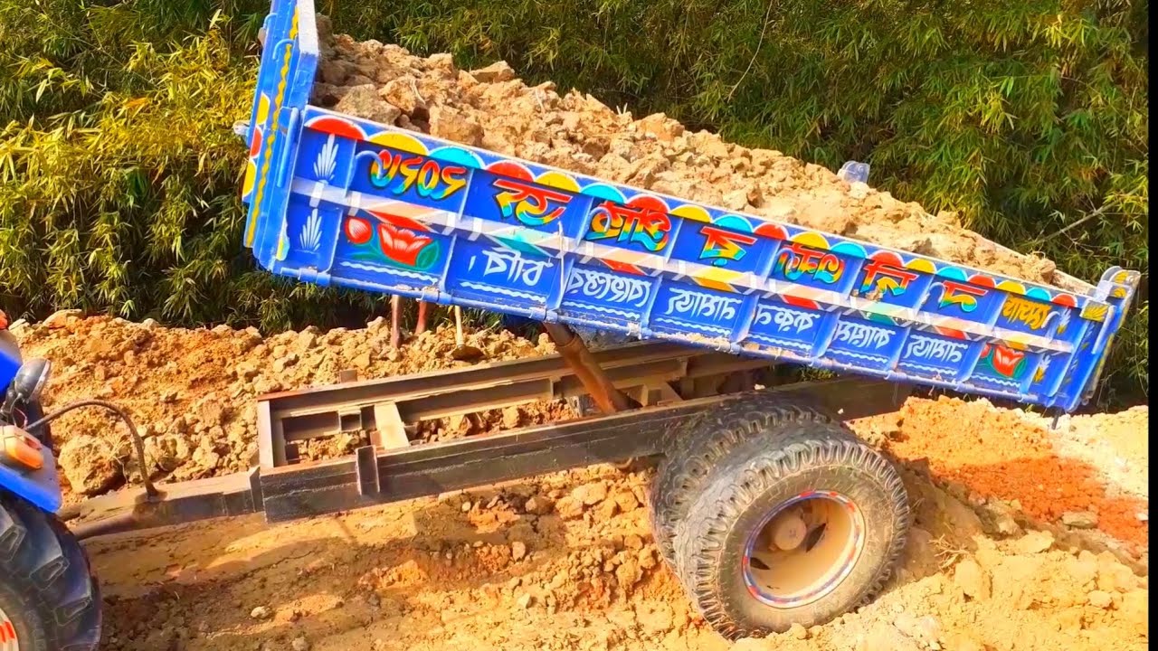 Driving full loaded Sonalika DI35 supreme Tractor Sand soil mixed loading and unloading