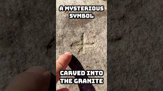 Carved into a #granite boulder in the middle of the #SpeedRiver I found this! #Templar #Guelph what?