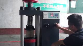 Electronic compression testing machine