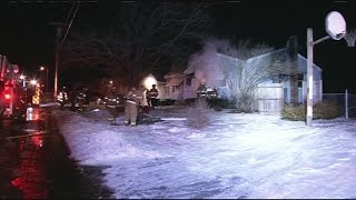 Firefighters control a house fire in Chicopee