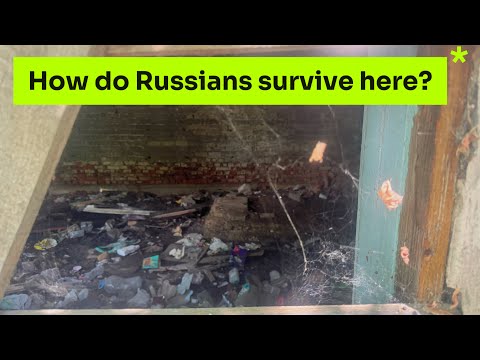 GARBAGE AND POOR SOVIET BUILDINGS NEAR RUSSIAN RIVER IN A TERRIBLE CONDITION
