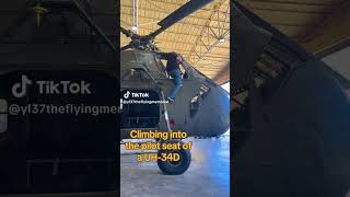 Climbing Into the Cockpit of a 1961 Sikorsky UH-34D Helicopter