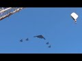 B2 (Stealth Bomber) flyover with F-22  Raptors