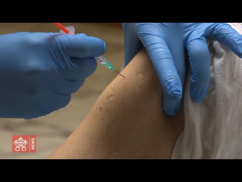 A group of Rome's homeless people receive their first Covid-19 vaccine dose