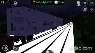 BN E9 commuter train overtakes BN freight